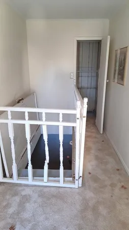 a view of a room with an entryway