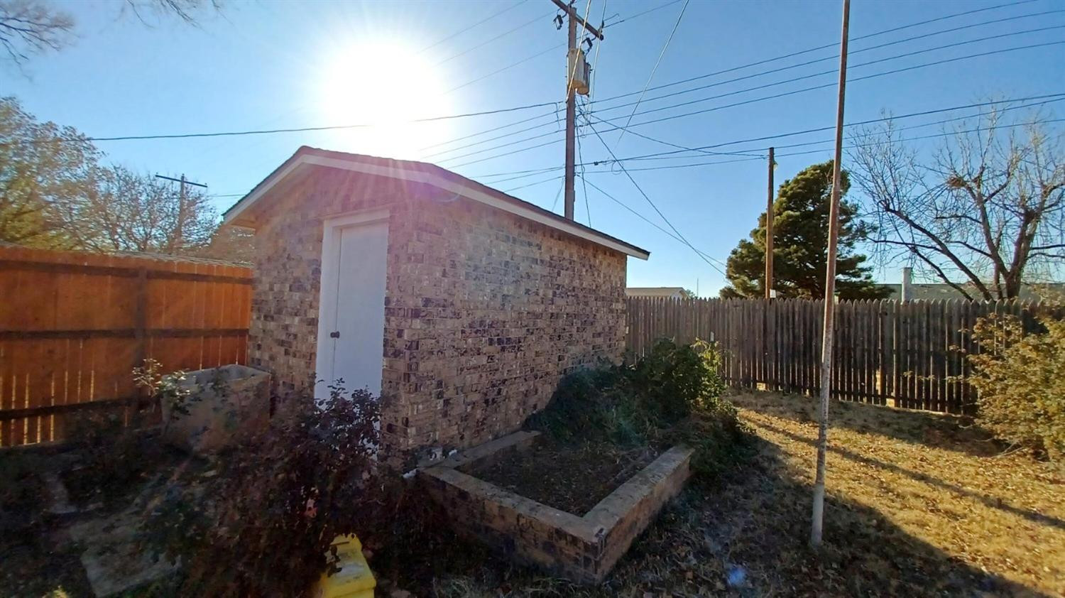 206 South W 7th Street Lockney, TX 79241 - Photo 42 of 47 a view of a house with backyard and garden
