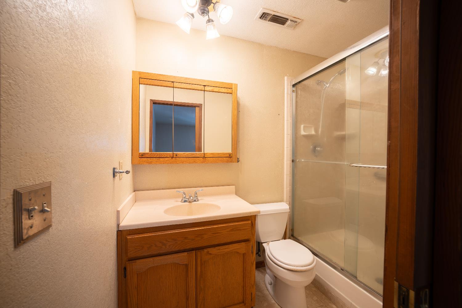 33 Stanley Road West Point, CA 95255 - Photo 24 of 46 a bathroom with a sink toilet and shower