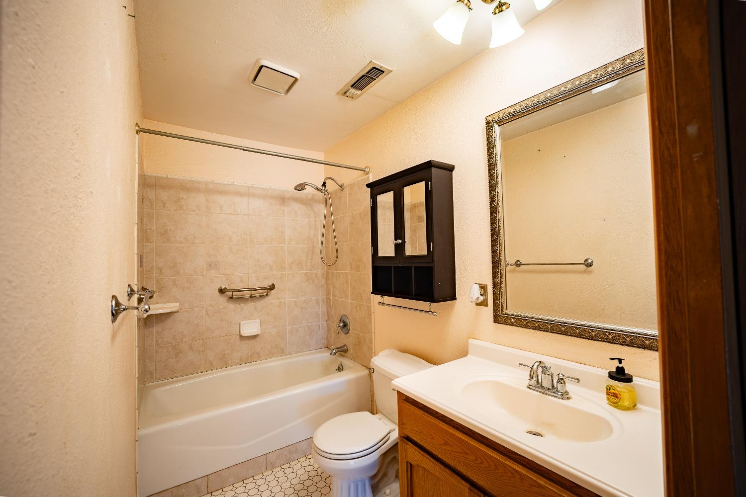 33 Stanley Road West Point, CA 95255 - Photo 24 of 51 a bathroom with a sink a toilet and shower