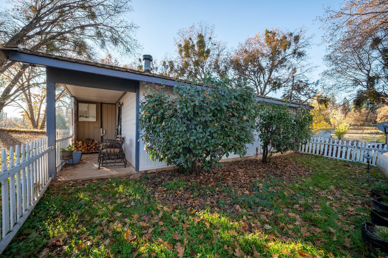33 Stanley Road West Point, CA 95255 - Photo 33 of 46 a view of a porch with a bench in a patio