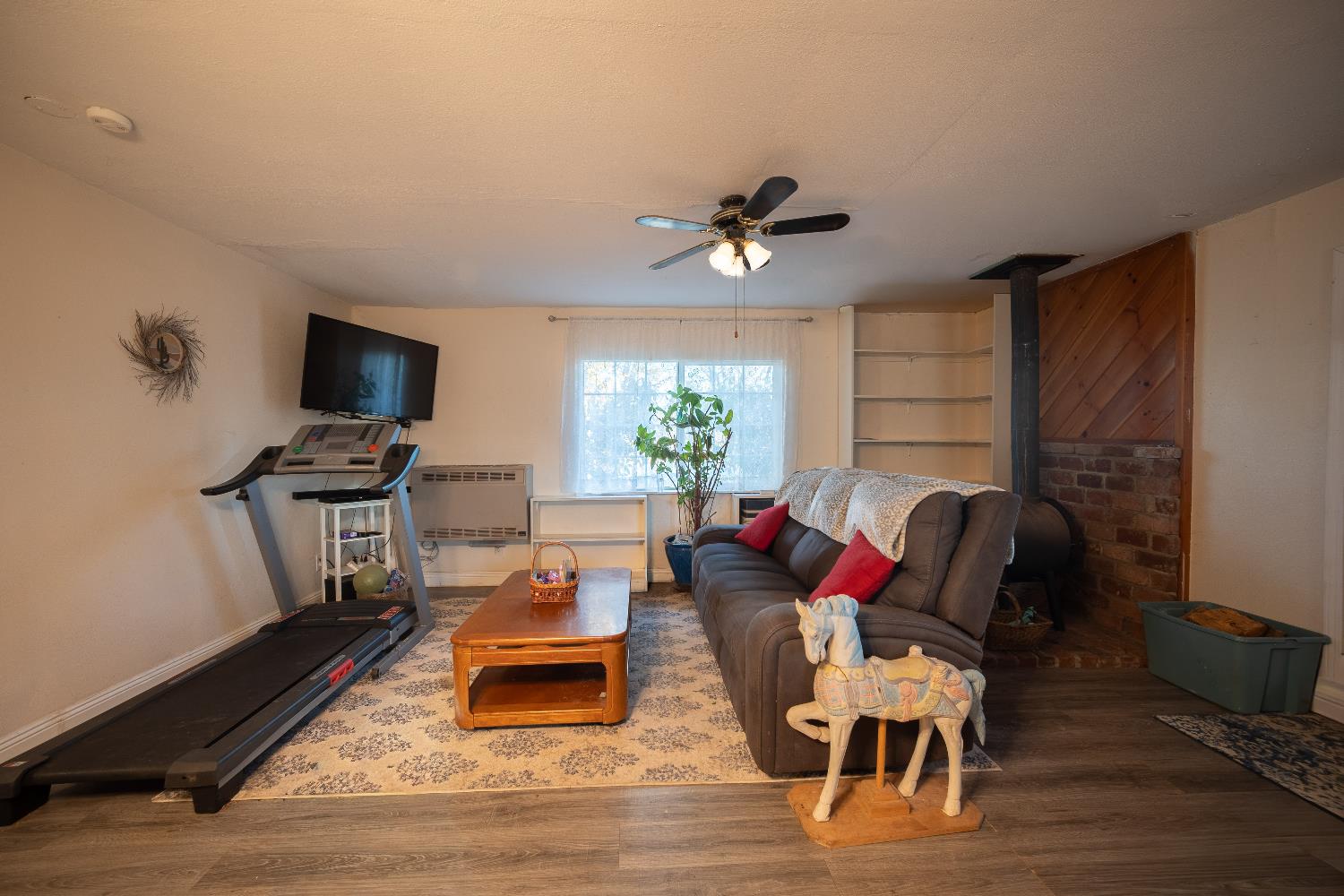 33 Stanley Road West Point, CA 95255 - Photo 40 of 51 a living room with furniture a rug and a flat screen tv
