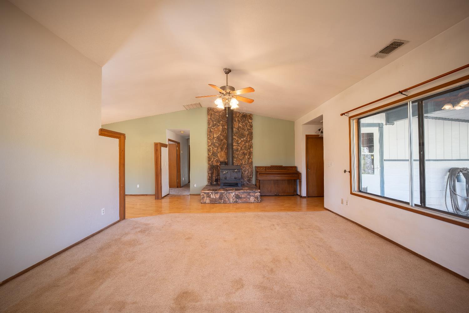 33 Stanley Road West Point, CA 95255 - Photo 7 of 46 wooden floor in an empty room with a window