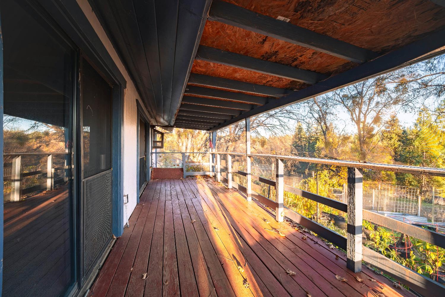 33 Stanley Road West Point, CA 95255 - Photo 9 of 51 a view of a balcony with wooden floor