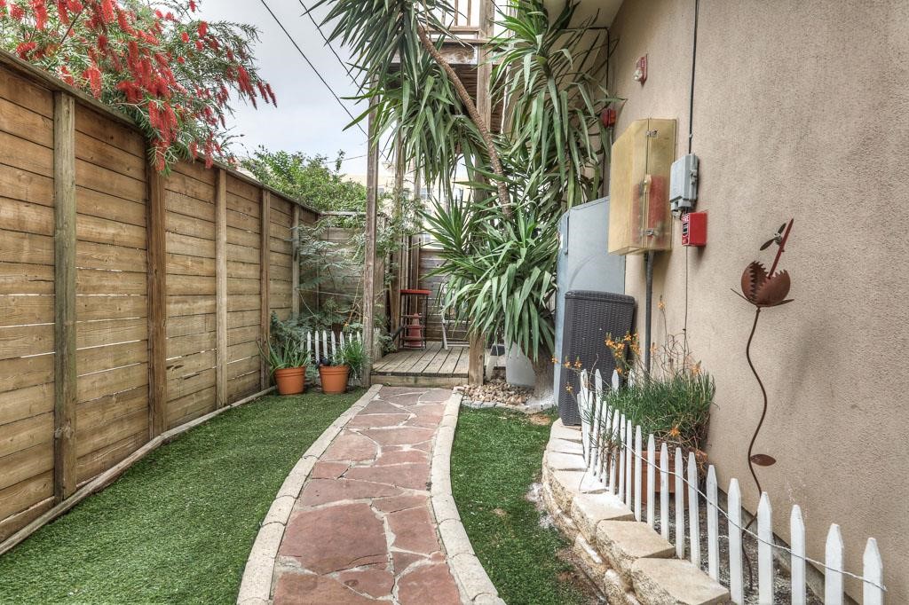 2310 Union Street, Unit A Houston, TX 77007 - Photo 15 of 16 a view of a porch with a yard and plants