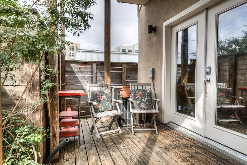 2310 Union Street, Unit A Houston, TX 77007 - Photo 16 of 16 a balcony view with a couple of chairs and a table