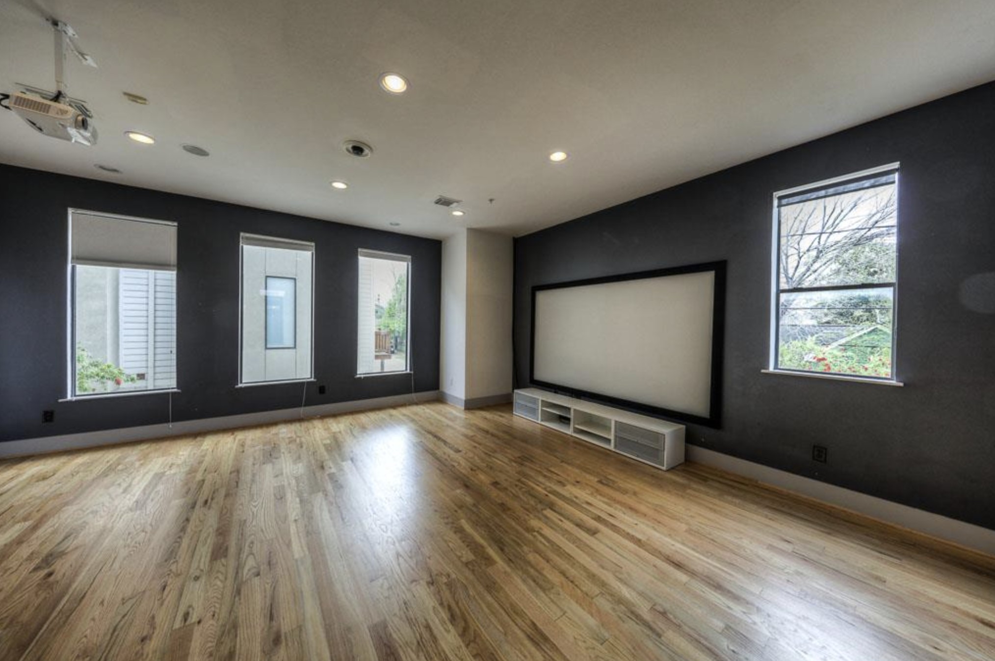 2310 Union Street, Unit A Houston, TX 77007 - Photo 3 of 16 a view of an empty room with wooden floor and a window