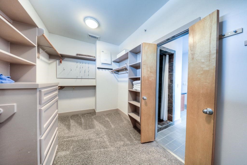 2310 Union Street, Unit A Houston, TX 77007 - Photo 4 of 16 a view of walk in closet with empty racks