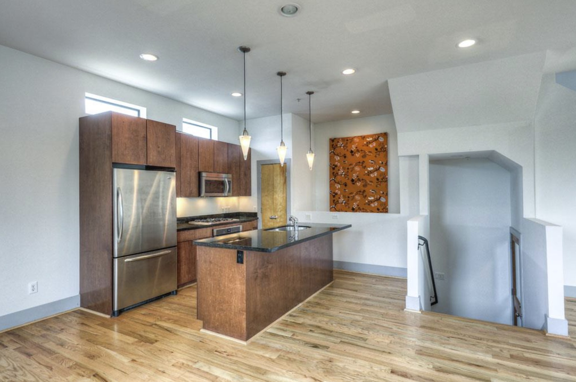 2310 Union Street, Unit A Houston, TX 77007 - Photo 8 of 16 a kitchen with stainless steel appliances granite countertop a refrigerator and a sink