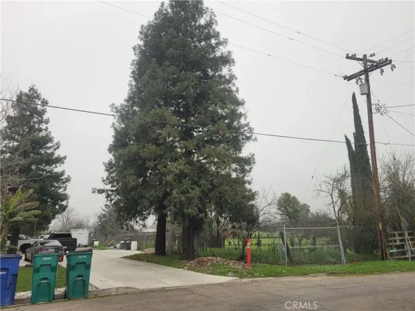 a view of street along with trees