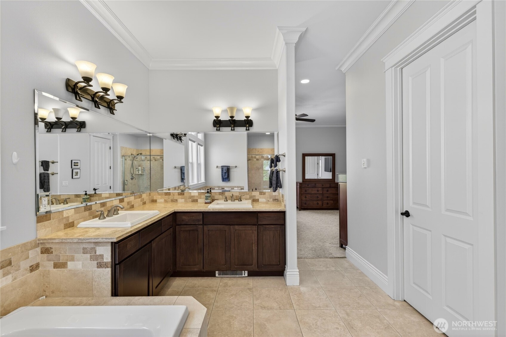 1908 29th Place Anacortes, WA 98221 - Photo 34 of 40 a spacious bathroom with a sink double vanity granite and a mirror