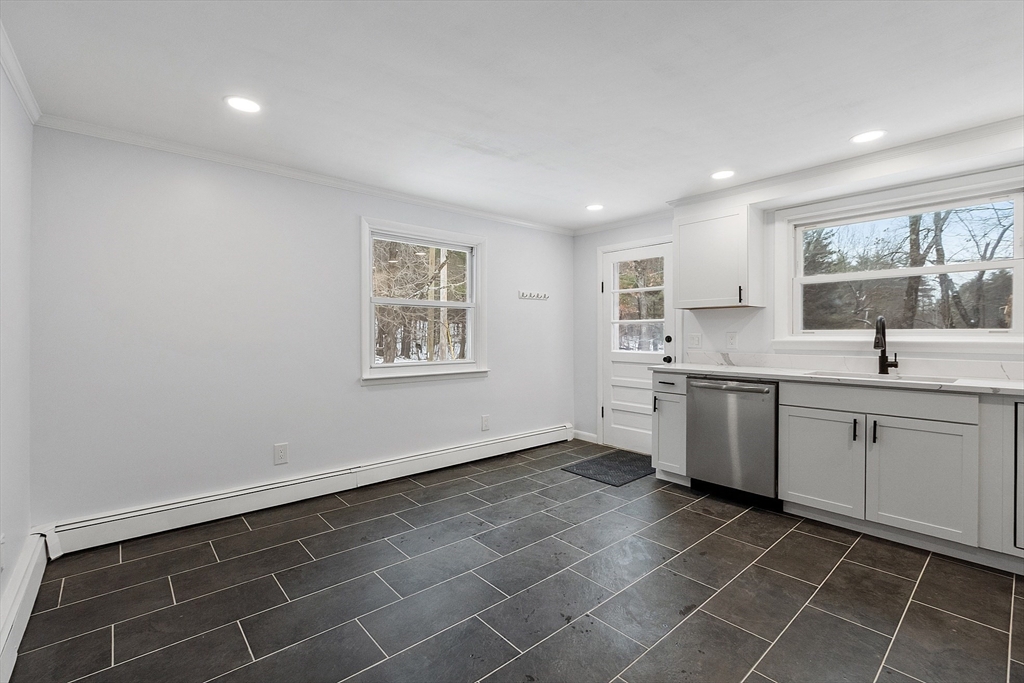 10 Townsend Road Shirley, MA 01464 - Photo 11 of 38 a kitchen with a sink cabinets and window