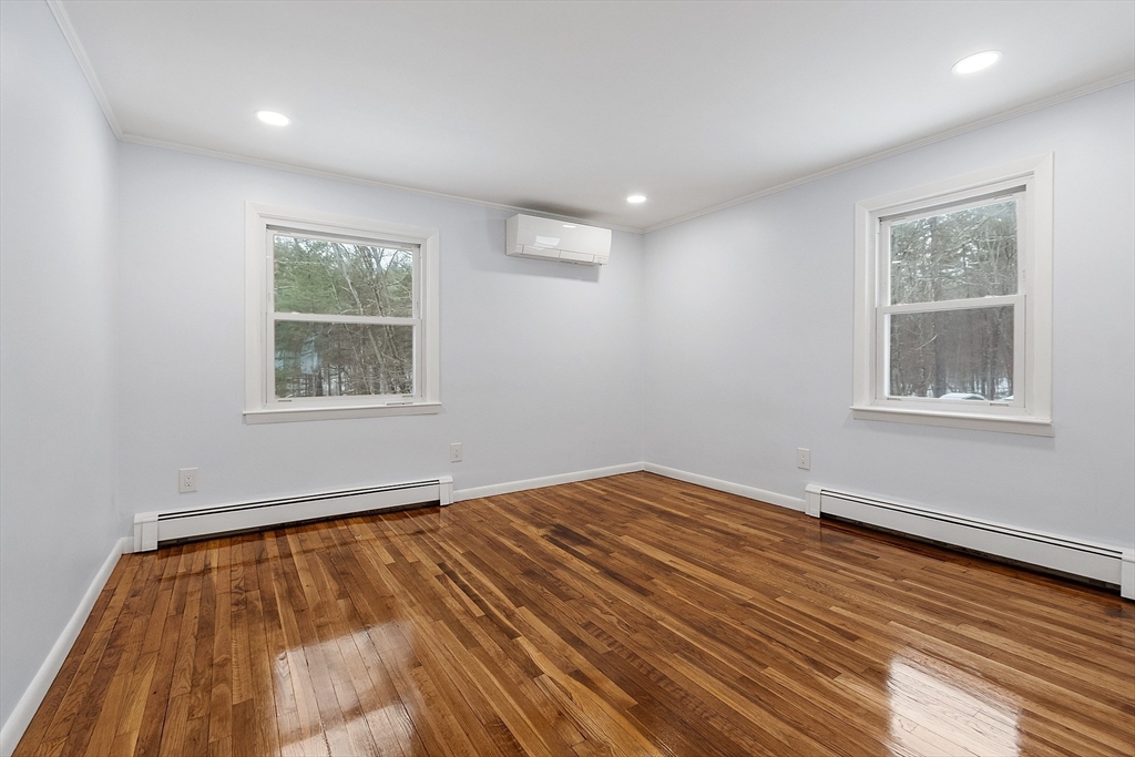 10 Townsend Road Shirley, MA 01464 - Photo 19 of 38 a view of empty room with wooden floor