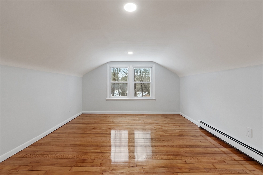 10 Townsend Road Shirley, MA 01464 - Photo 23 of 38 wooden floor in an empty room with a window