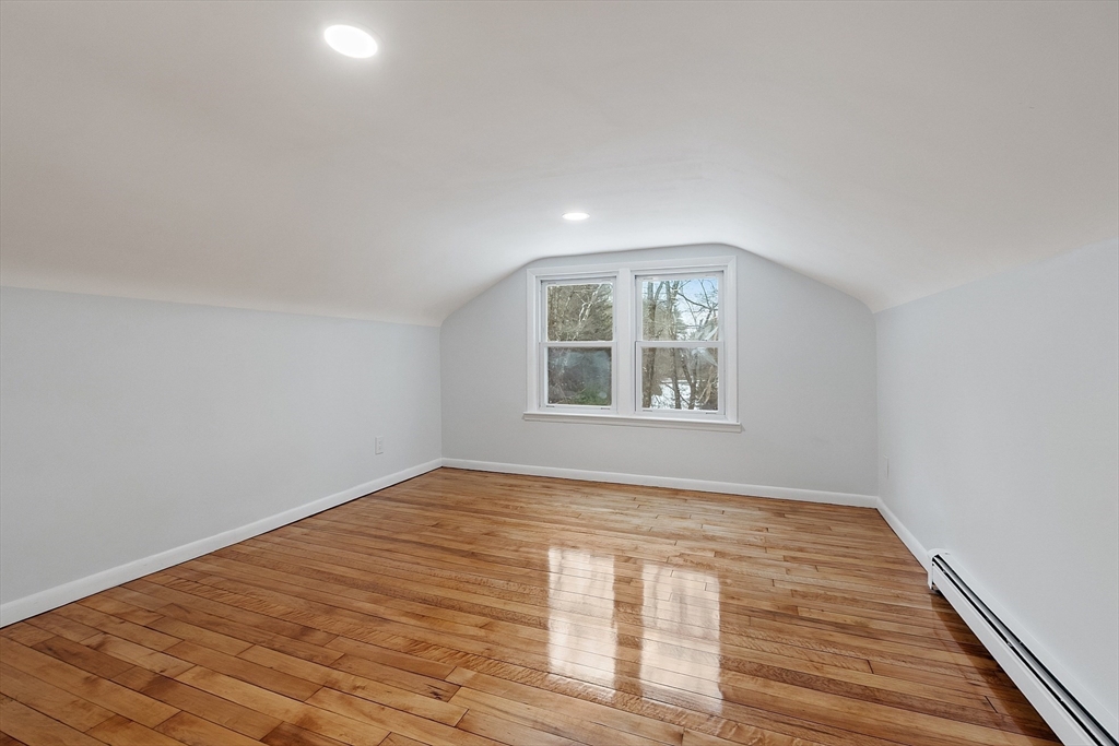 10 Townsend Road Shirley, MA 01464 - Photo 24 of 38 wooden floor in an empty room with a window