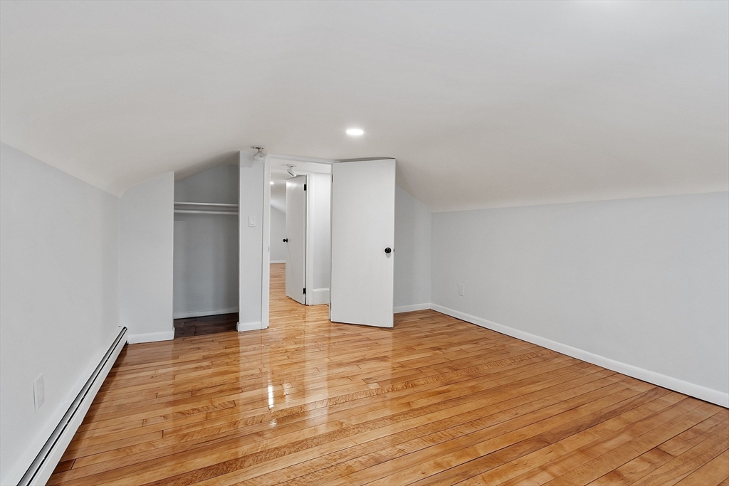 10 Townsend Road Shirley, MA 01464 - Photo 25 of 38 a view of an empty room with wooden floor