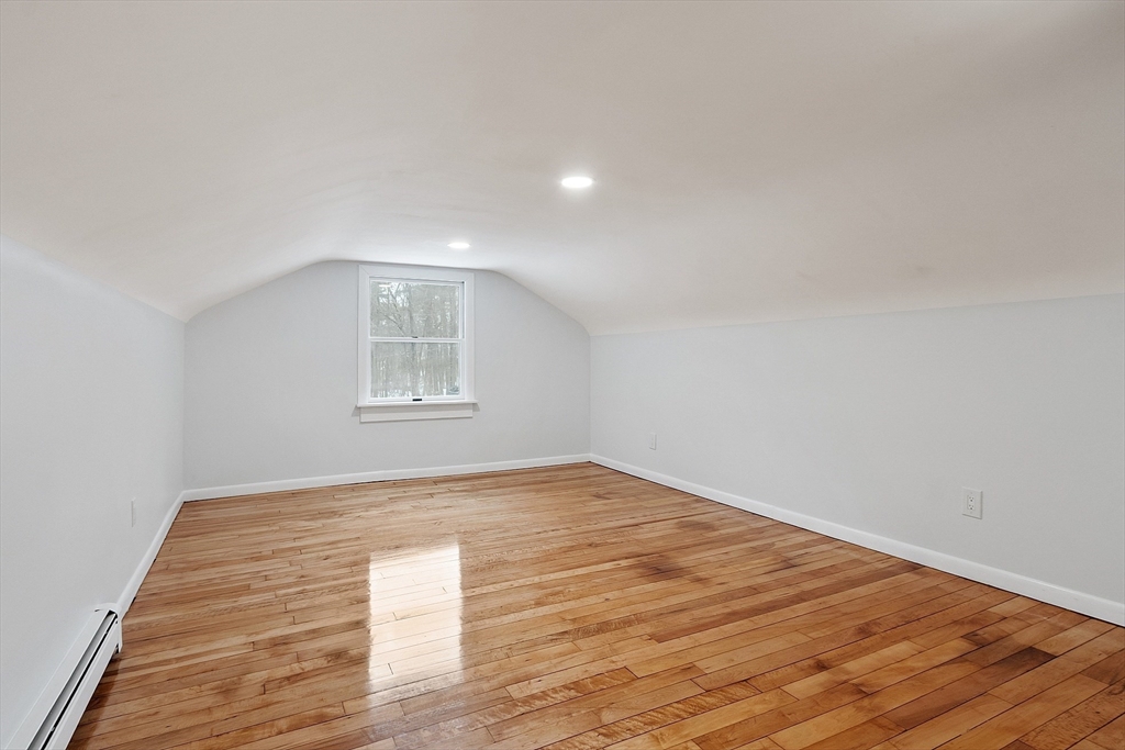 10 Townsend Road Shirley, MA 01464 - Photo 26 of 38 a view of empty room with wooden floor and fan