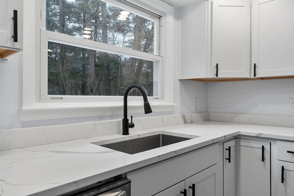 10 Townsend Road Shirley, MA 01464 - Photo 9 of 38 a kitchen with a sink and a window