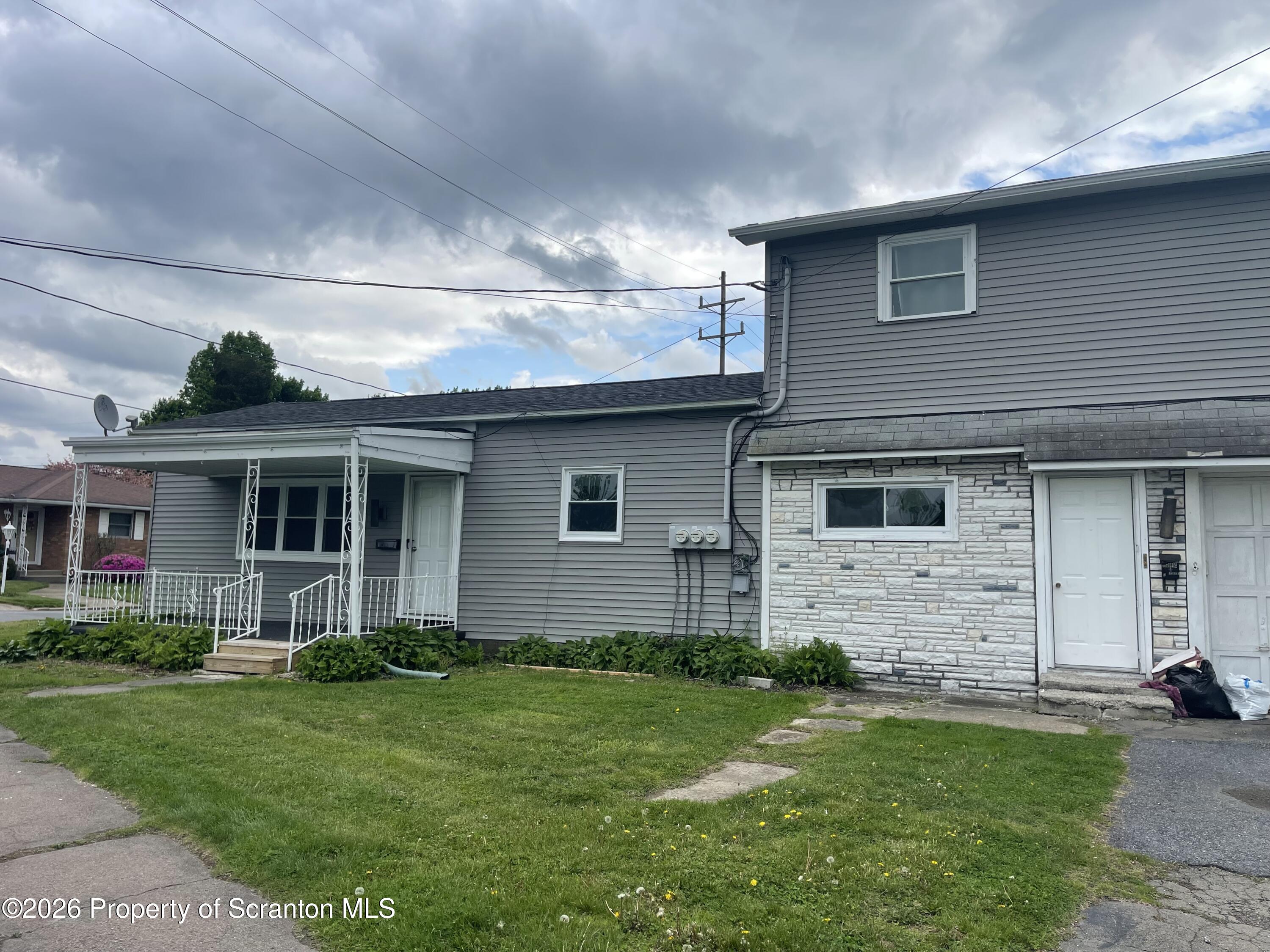 238 George Street Moosic, PA 18507 - Photo 2 of 23 a view of a house with a yard