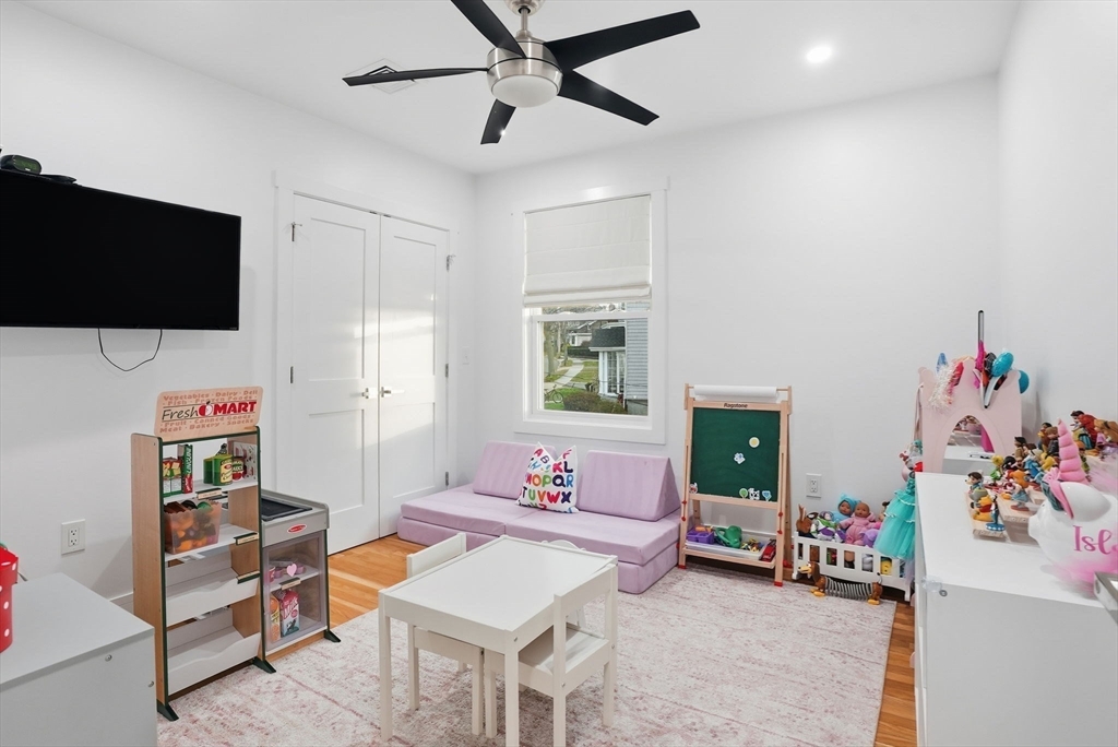 191 Court Road, Unit 3 Winthrop, MA 02152 - Photo 12 of 23 a living room with furniture and a flat screen tv