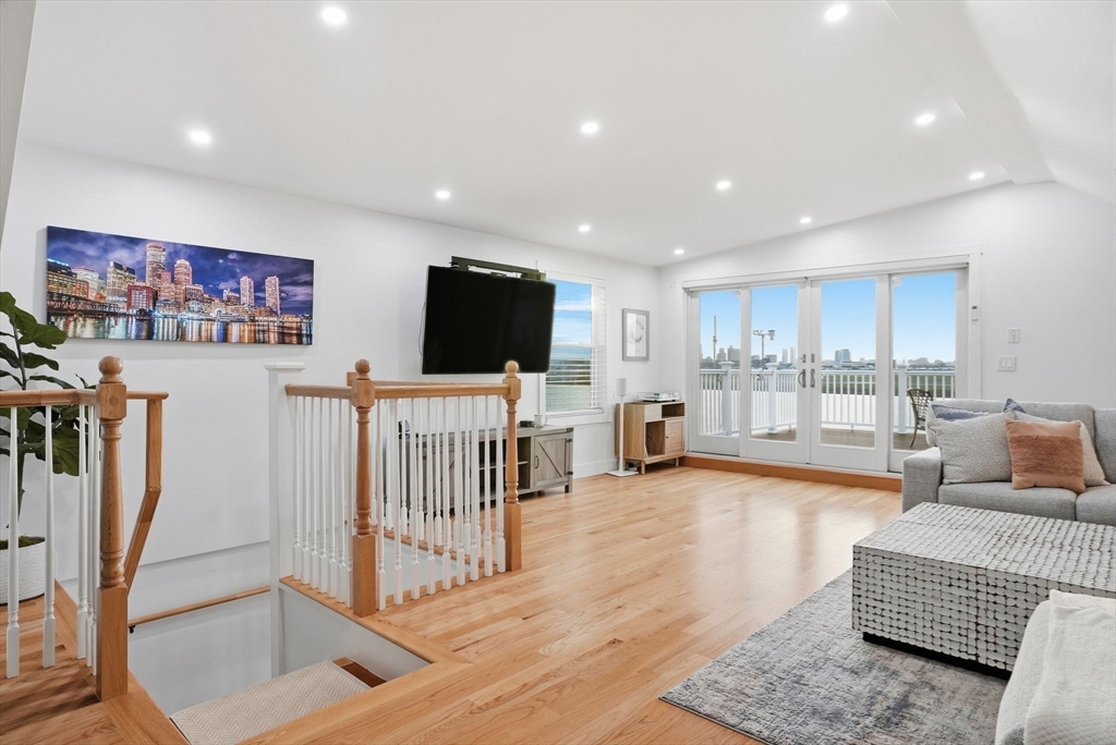 191 Court Road, Unit 3 Winthrop, MA 02152 - Photo 14 of 23 a living room with furniture and a flat screen tv