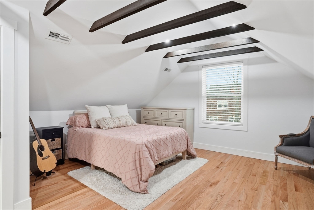 191 Court Road, Unit 3 Winthrop, MA 02152 - Photo 17 of 23 a bedroom with a bed and a window