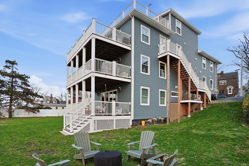 191 Court Road, Unit 3 Winthrop, MA 02152 - Photo 22 of 23 a front view of a house with a yard