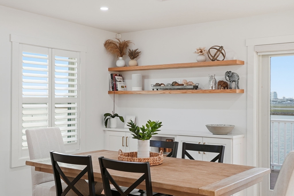 191 Court Road, Unit 3 Winthrop, MA 02152 - Photo 5 of 23 a room with a table and chair