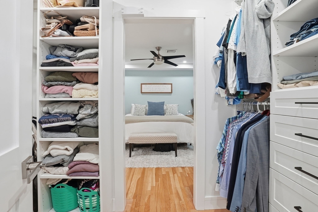 191 Court Road, Unit 3 Winthrop, MA 02152 - Photo 8 of 23 a view of walk in closet with clothes and shoes