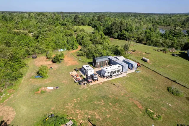 a view of a lake with a yard