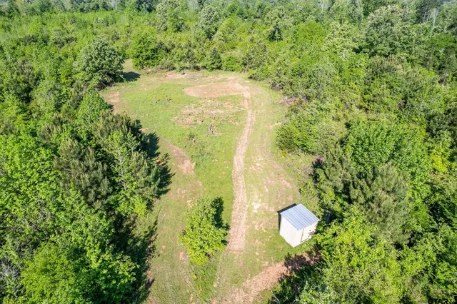 a view of a lake with a house
