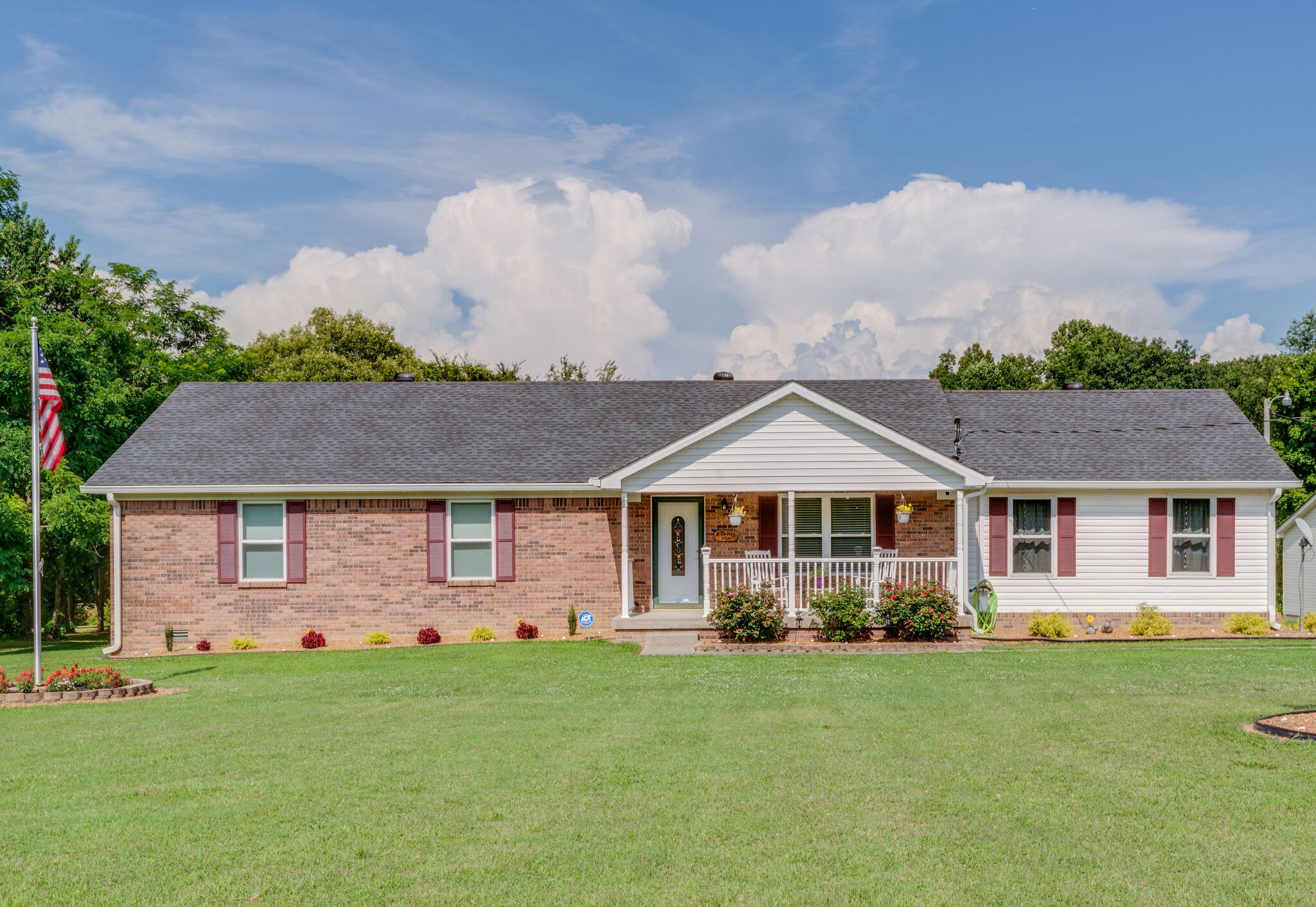 2755 Gideon Road Greenbrier, TN 37073 - Photo 2 of 30 a front view of a house with a garden