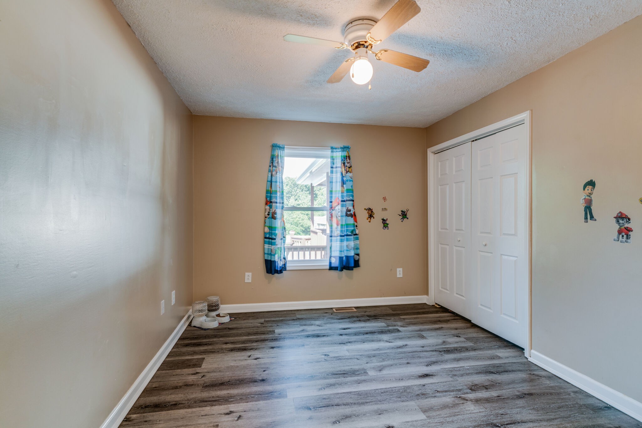2755 Gideon Road Greenbrier, TN 37073 - Photo 21 of 30 wooden floor in an empty room with a window