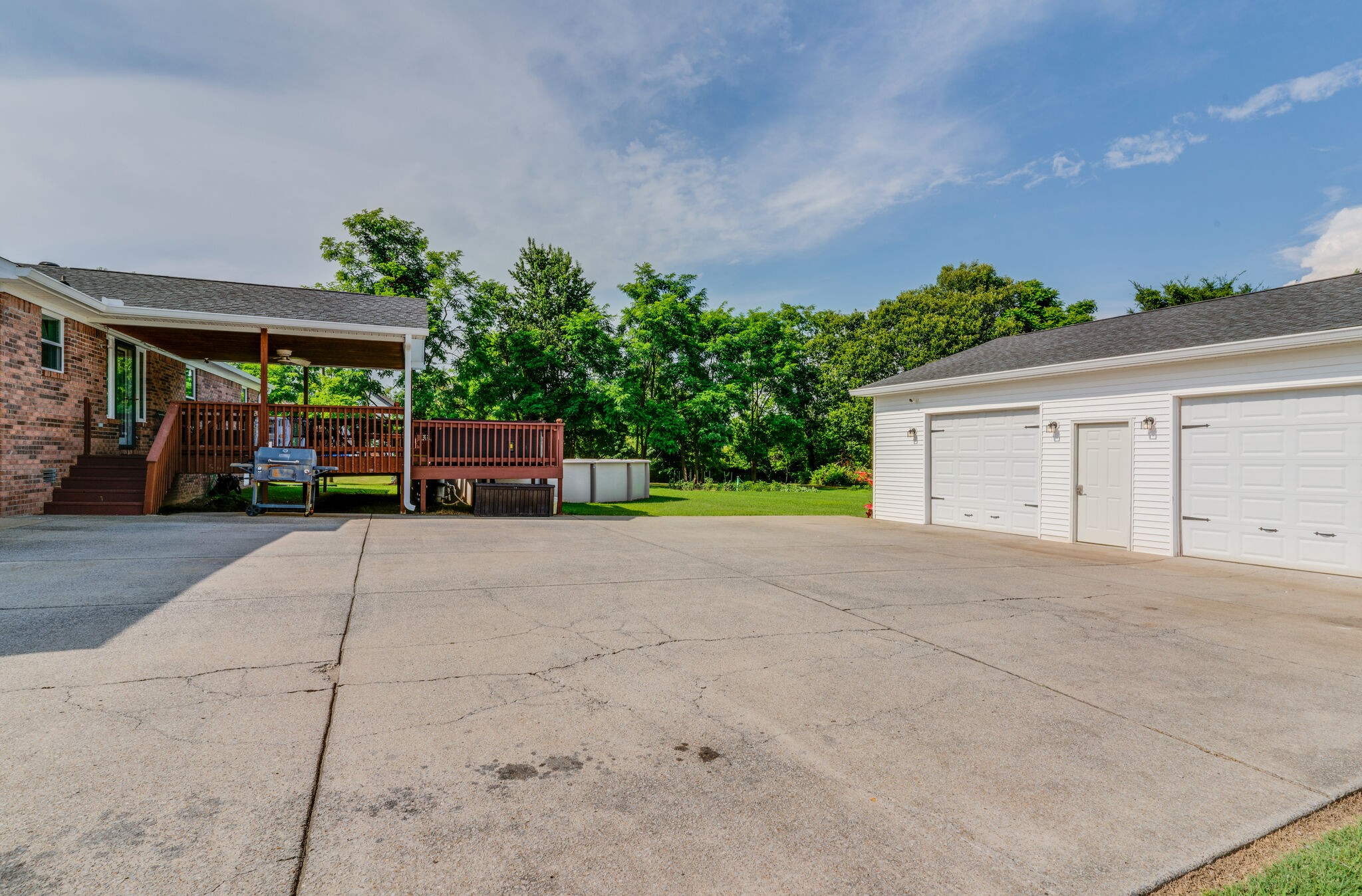2755 Gideon Road Greenbrier, TN 37073 - Photo 27 of 30 a view of a house with a yard and a garage