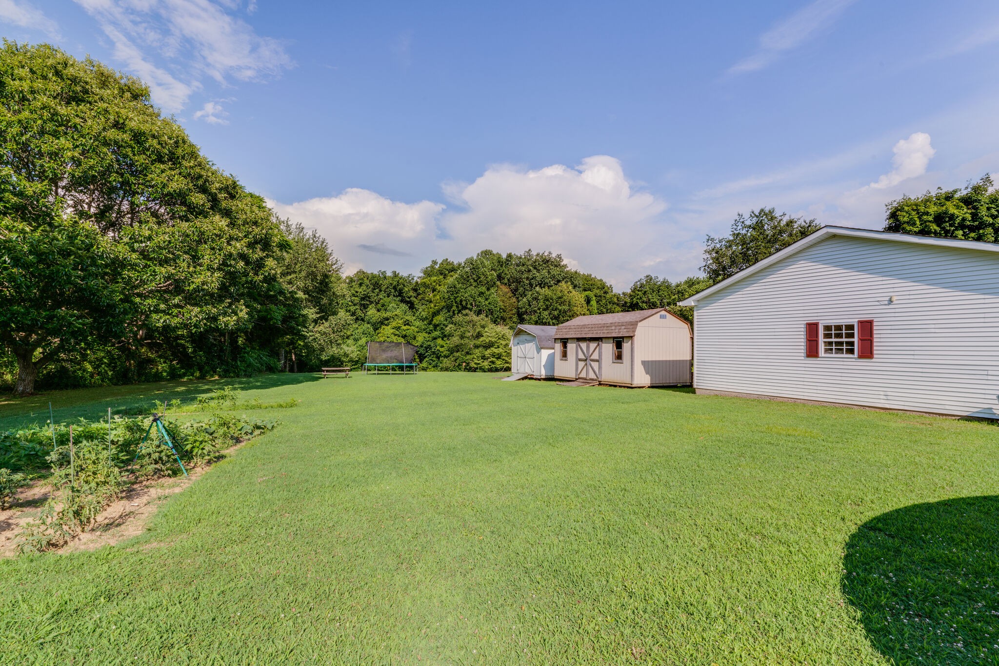 2755 Gideon Road Greenbrier, TN 37073 - Photo 29 of 30 a front view of a house with garden