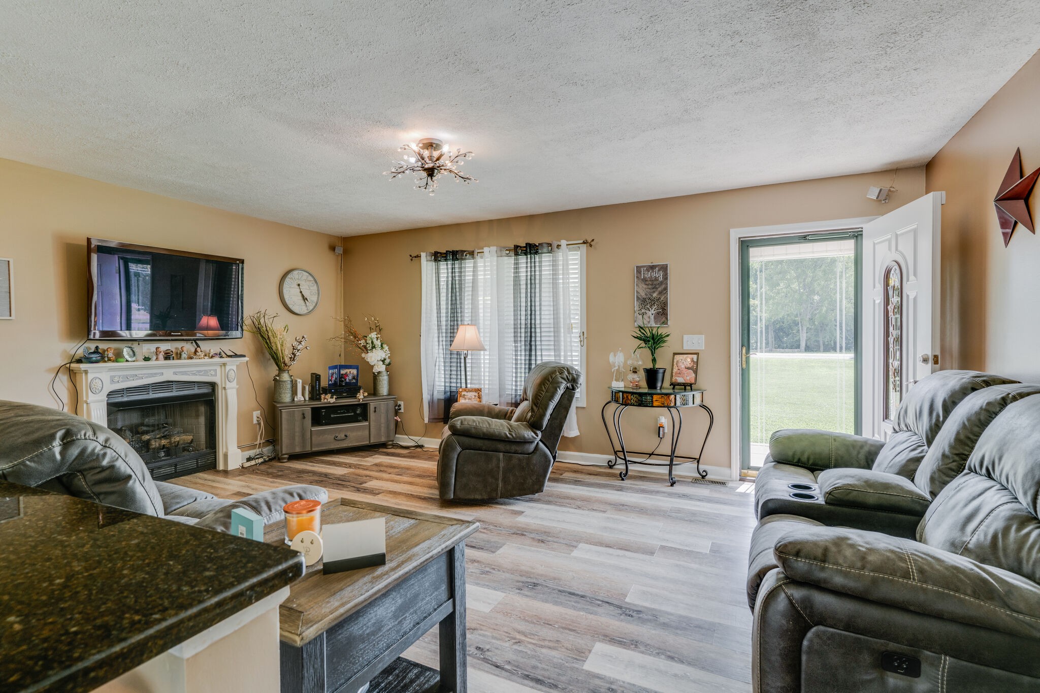 2755 Gideon Road Greenbrier, TN 37073 - Photo 6 of 30 a living room with furniture and a fireplace