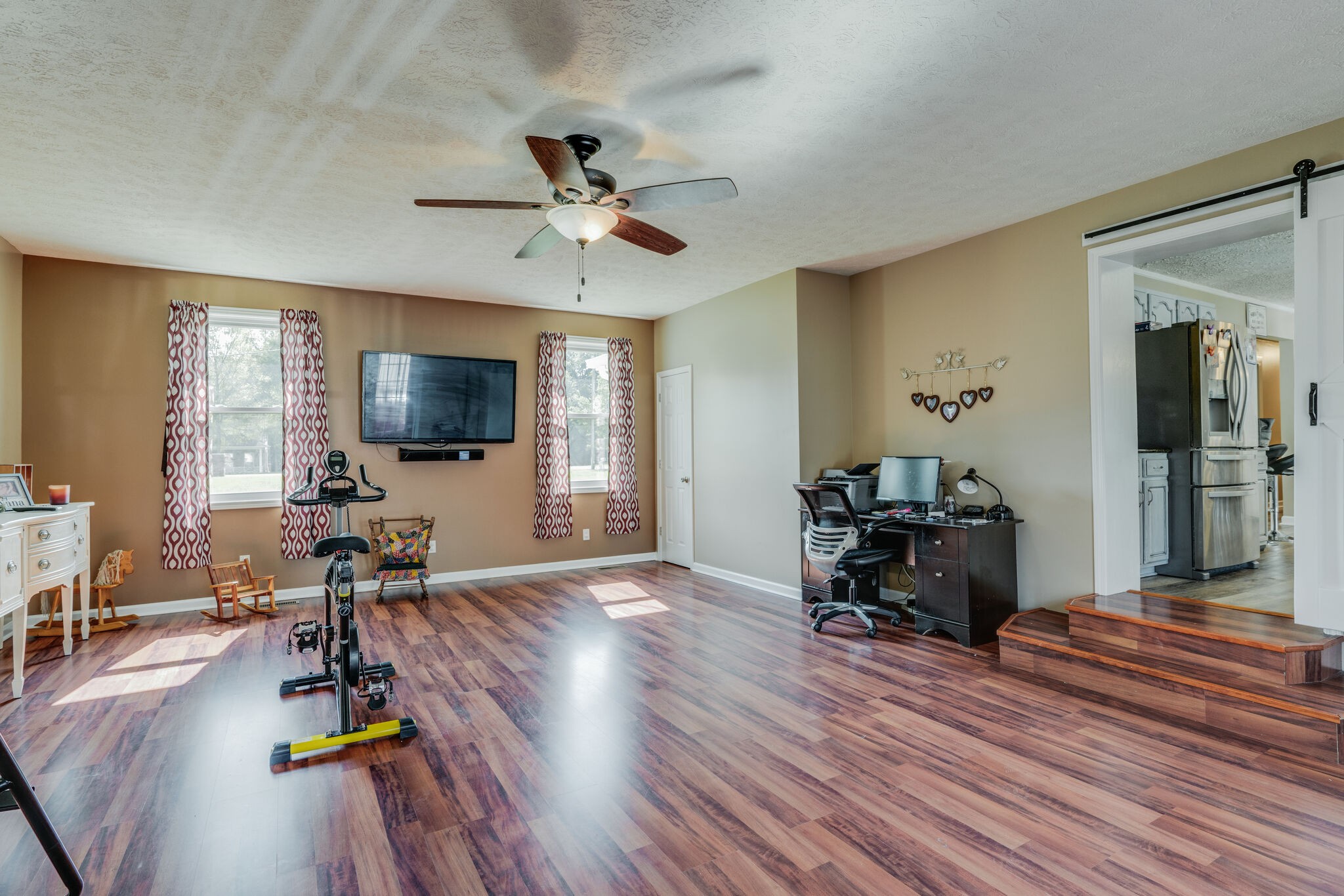 2755 Gideon Road Greenbrier, TN 37073 - Photo 10 of 30 a living room with furniture and a flat screen tv