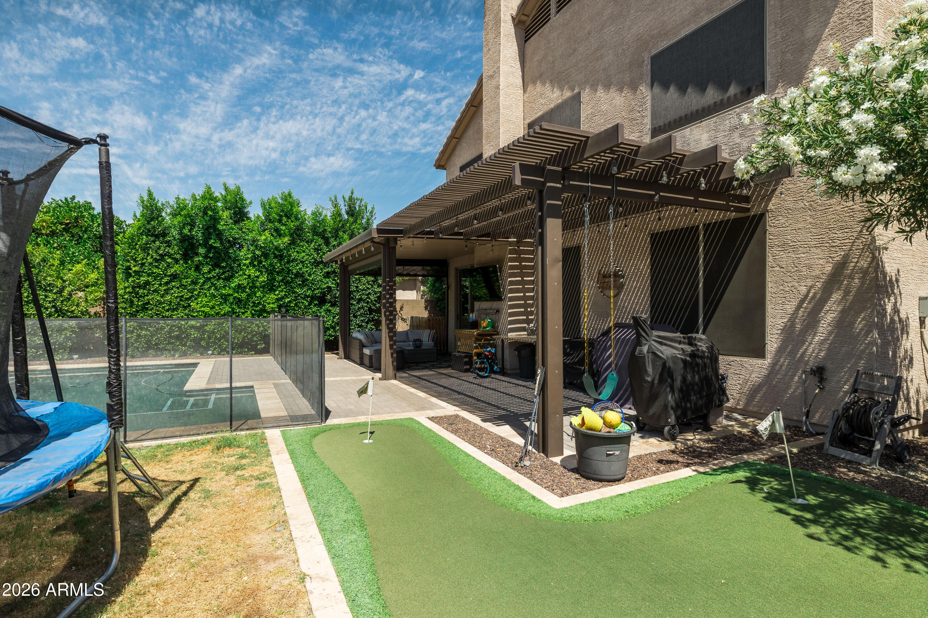 6407 West Saddlehorn Road Phoenix, AZ 85083 - Photo 8 of 41 a view of a swimming pool with a patio