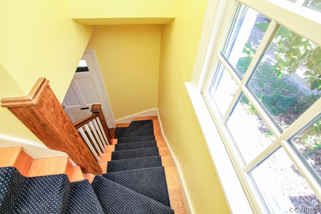 1011 Pine Ridge Road Richmond, VA 23226 - Photo 16 of 19 Carpeted stairway with a window!