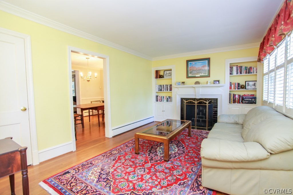 1011 Pine Ridge Road Richmond, VA 23226 - Photo 2 of 19 Formal living room with fireplace, custom built in