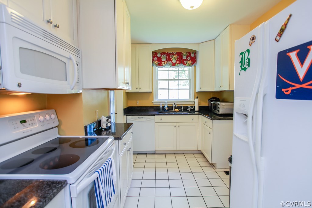 1011 Pine Ridge Road Richmond, VA 23226 - Photo 3 of 19 Updated kitchen with granite counters and tile flo