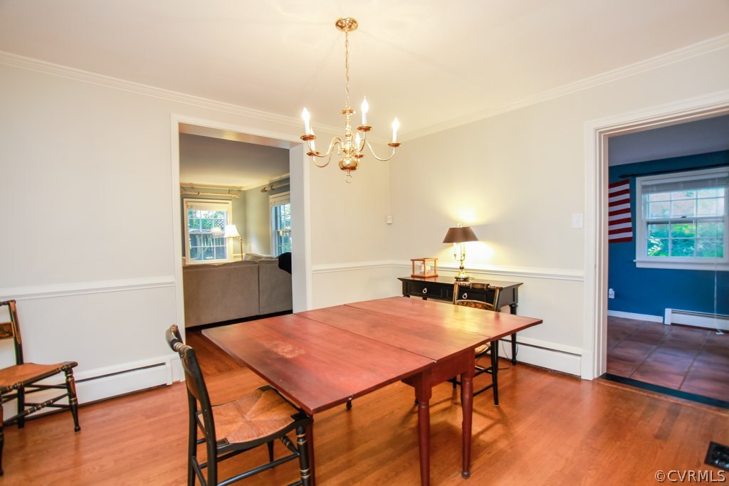1011 Pine Ridge Road Richmond, VA 23226 - Photo 6 of 19 Formal dining room with beautiful floor & moulding