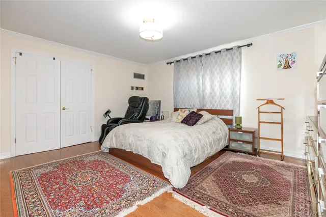 a bed room with a bed and a window