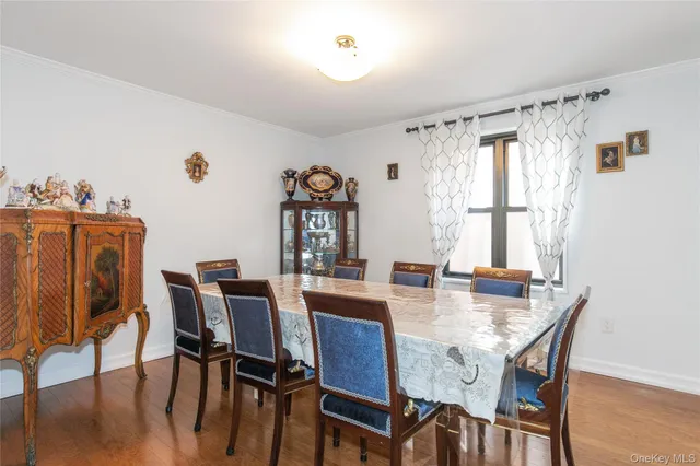 a view of a dining room with furniture and window