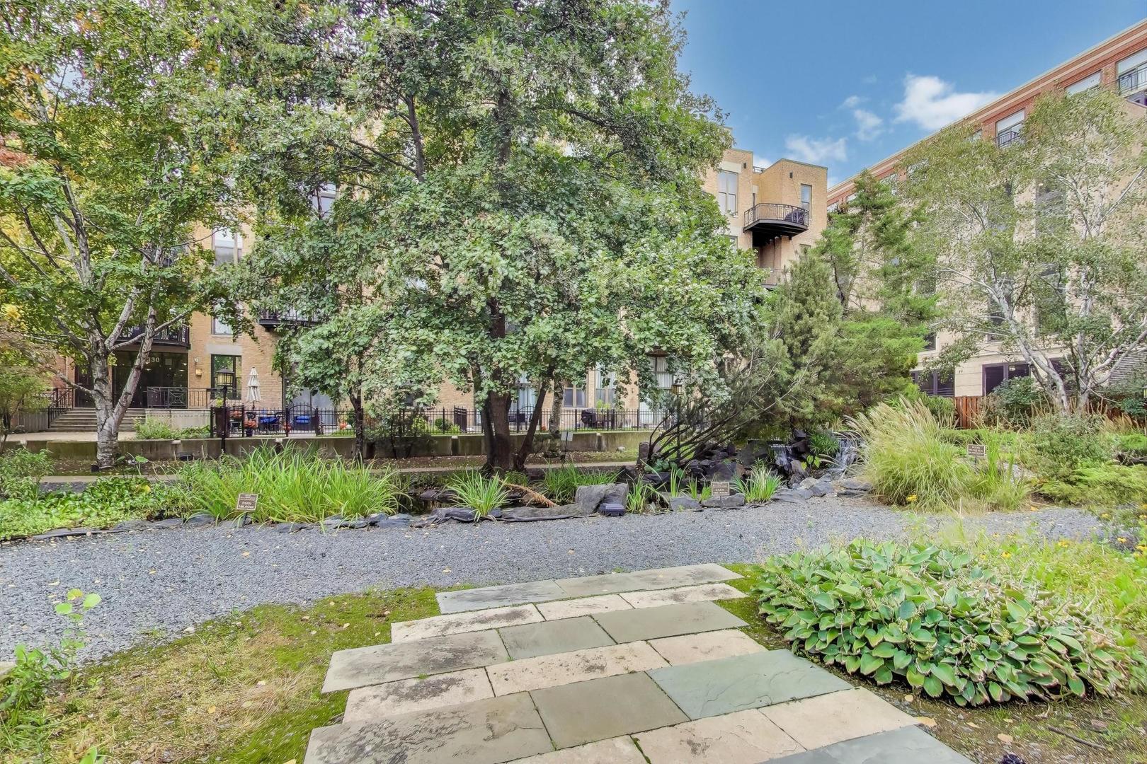 1301 West Madison Street, Unit 315 Chicago, IL 60607 - Photo 26 of 27 a view of a park with plants and trees
