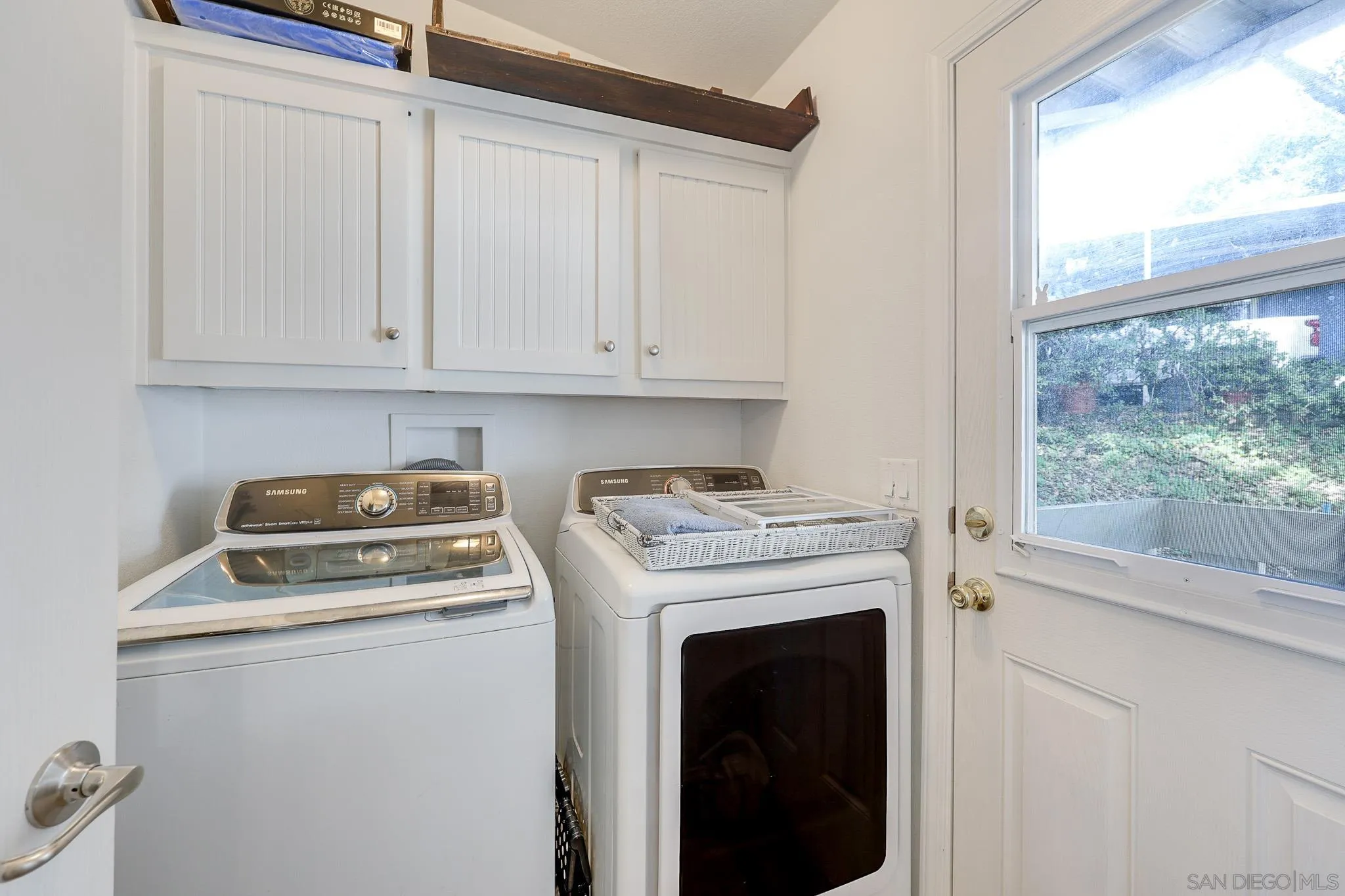 3505 Alpine Boulevard, Unit SPC 11 Alpine, CA 91901 - Photo 19 of 43 a kitchen with a stove and a white cabinet