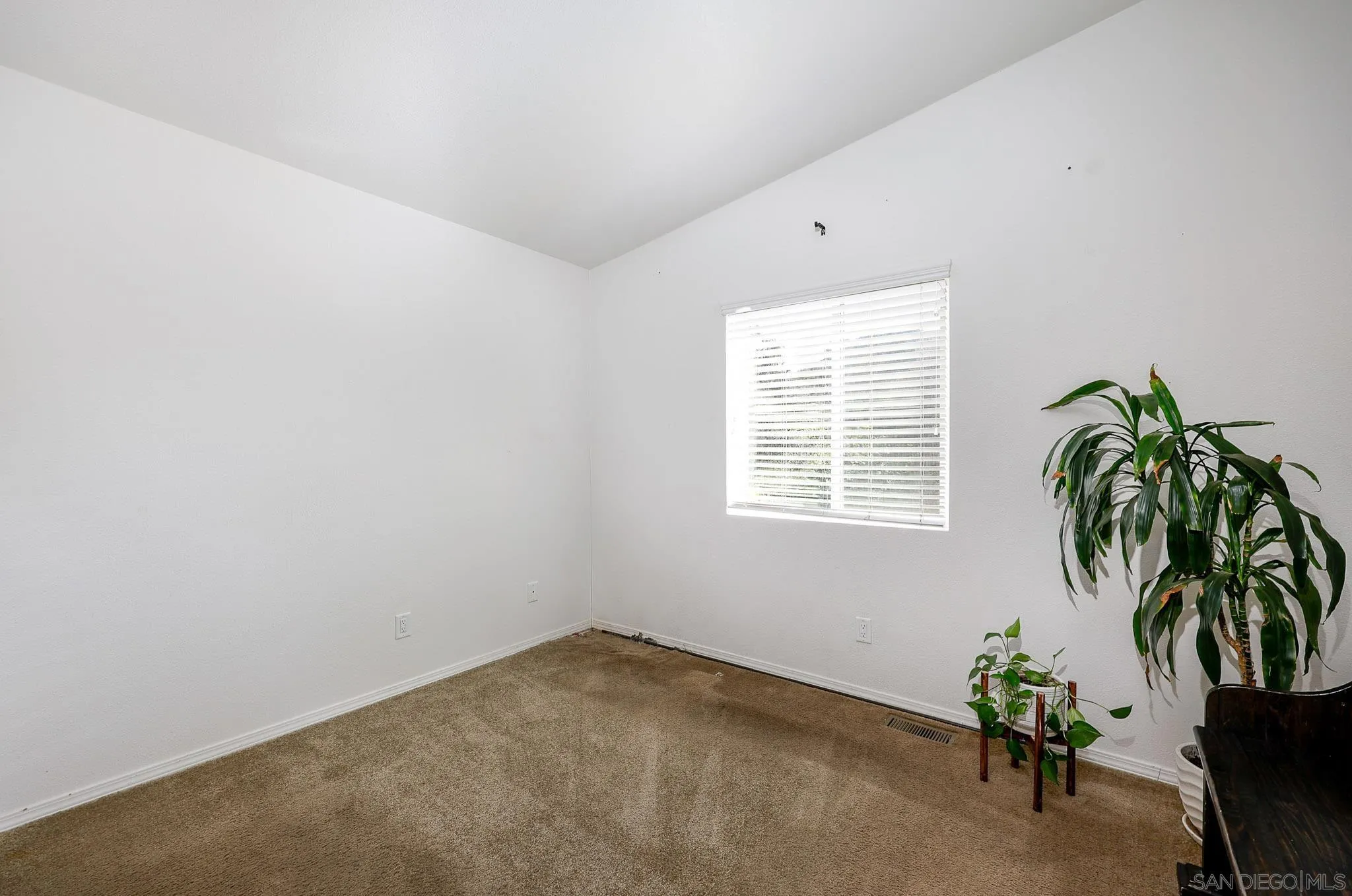 3505 Alpine Boulevard, Unit SPC 11 Alpine, CA 91901 - Photo 20 of 43 a view of a room with window and a potted plant