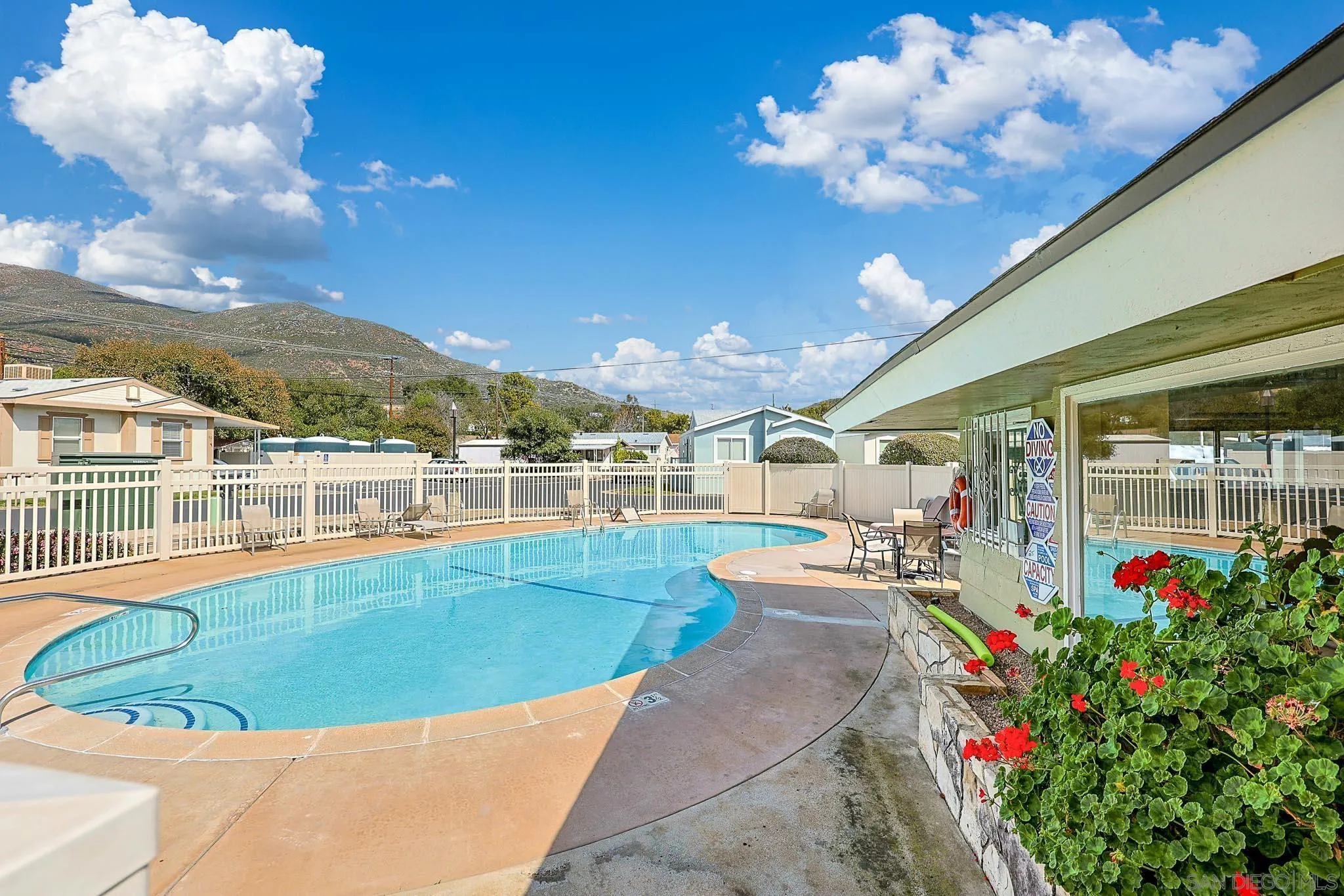 3505 Alpine Boulevard, Unit SPC 11 Alpine, CA 91901 - Photo 22 of 43 a view of a swimming pool with an outdoor seating