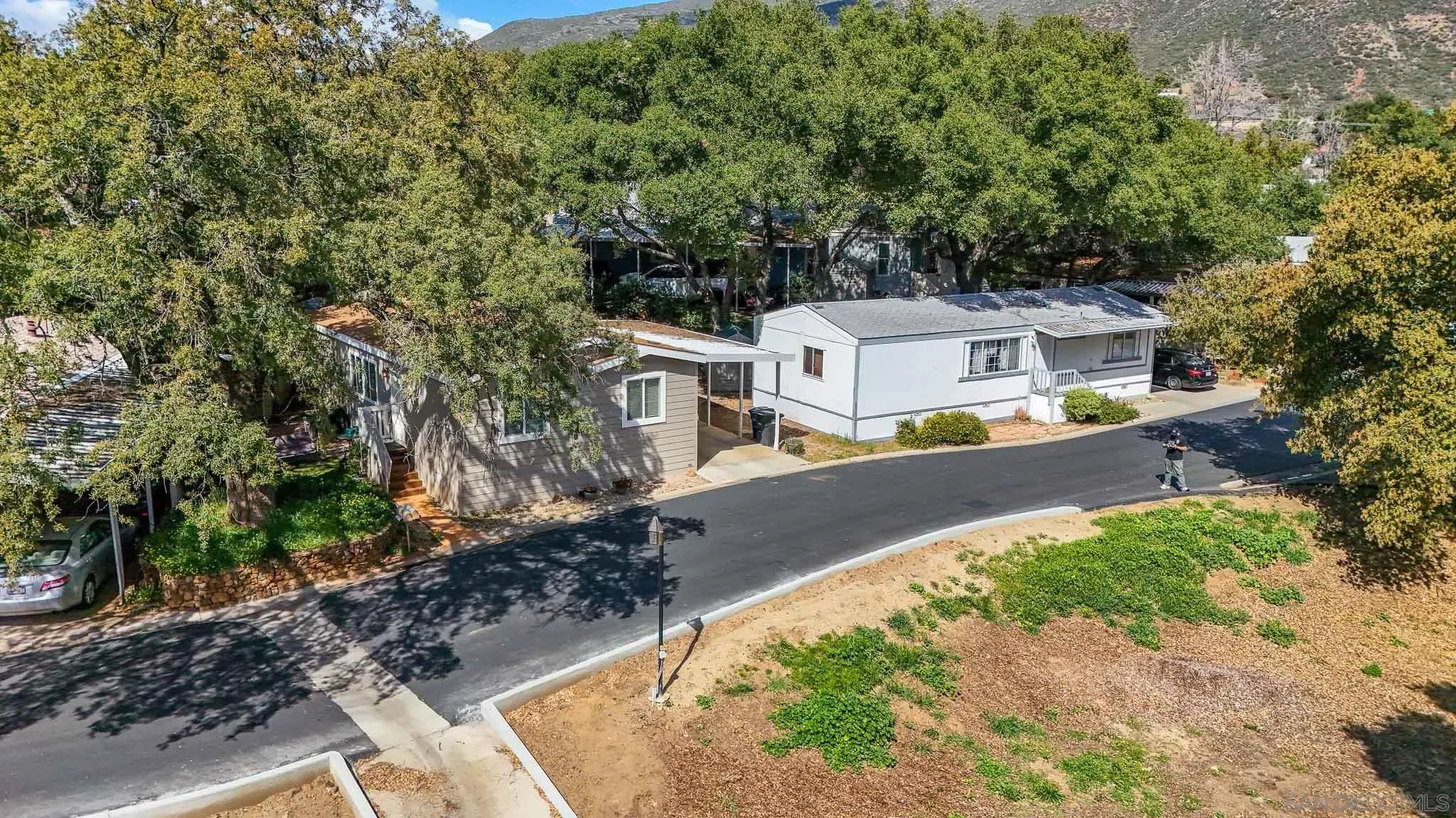 3505 Alpine Boulevard, Unit SPC 11 Alpine, CA 91901 - Photo 33 of 43 a view of a house with a yard