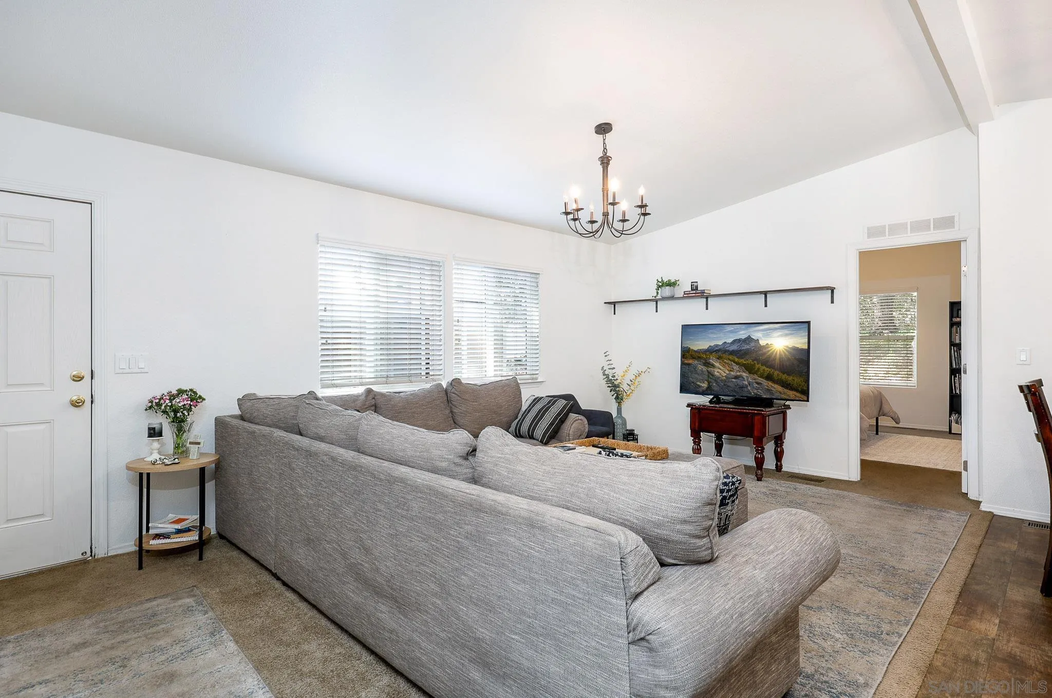 3505 Alpine Boulevard, Unit SPC 11 Alpine, CA 91901 - Photo 6 of 43 a living room with furniture and a flat screen tv
